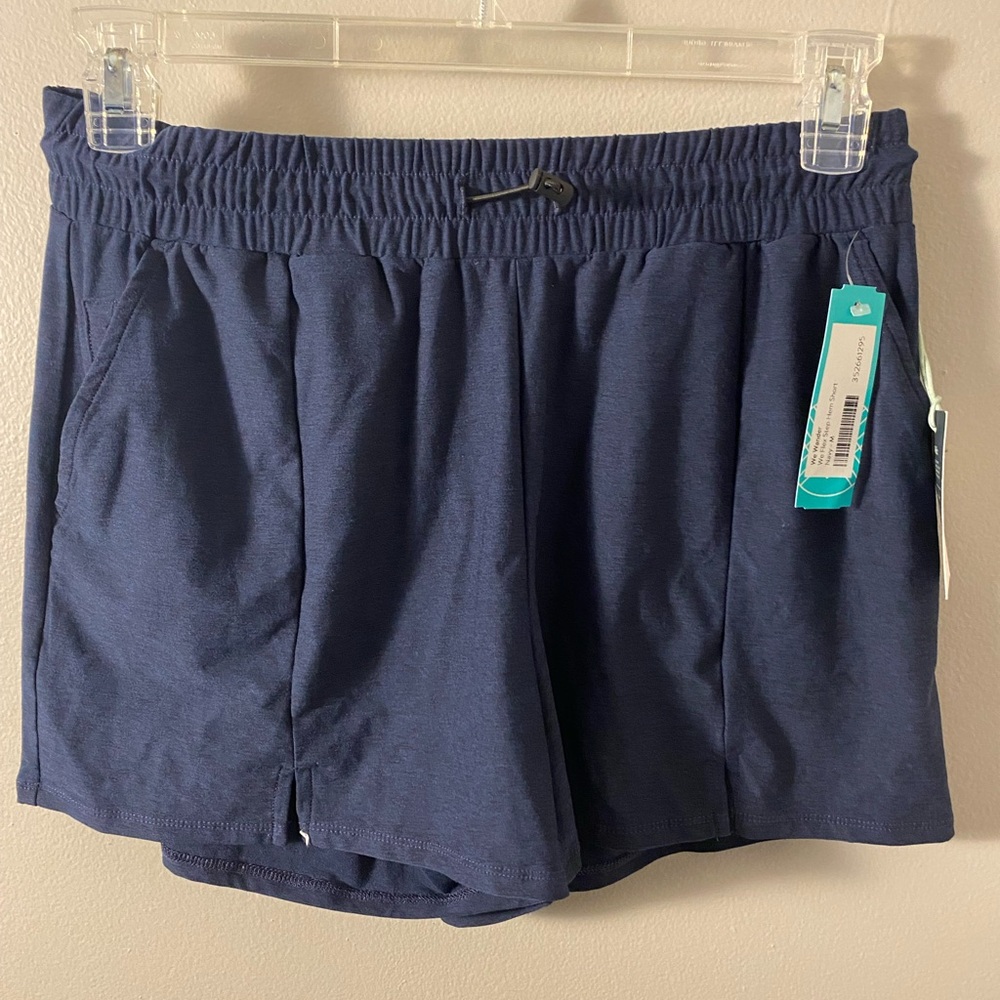 We Wander Flex Step Hem Short Navy Medium New